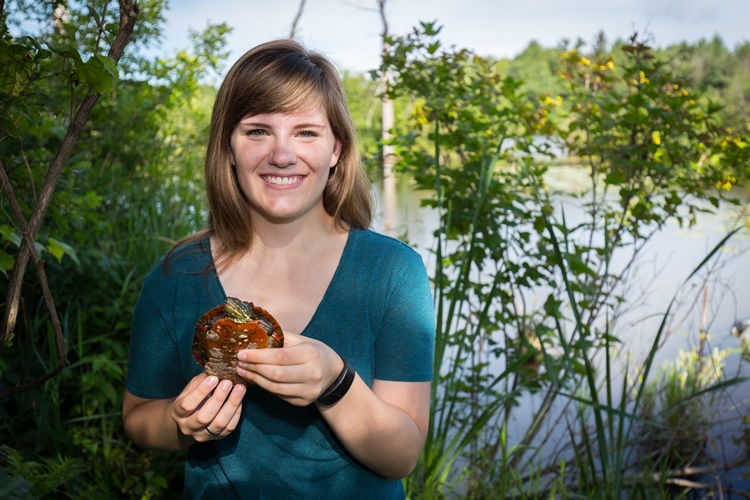 UW-Stevens Point Biology Major Mara Hathaway holds a painted turtle