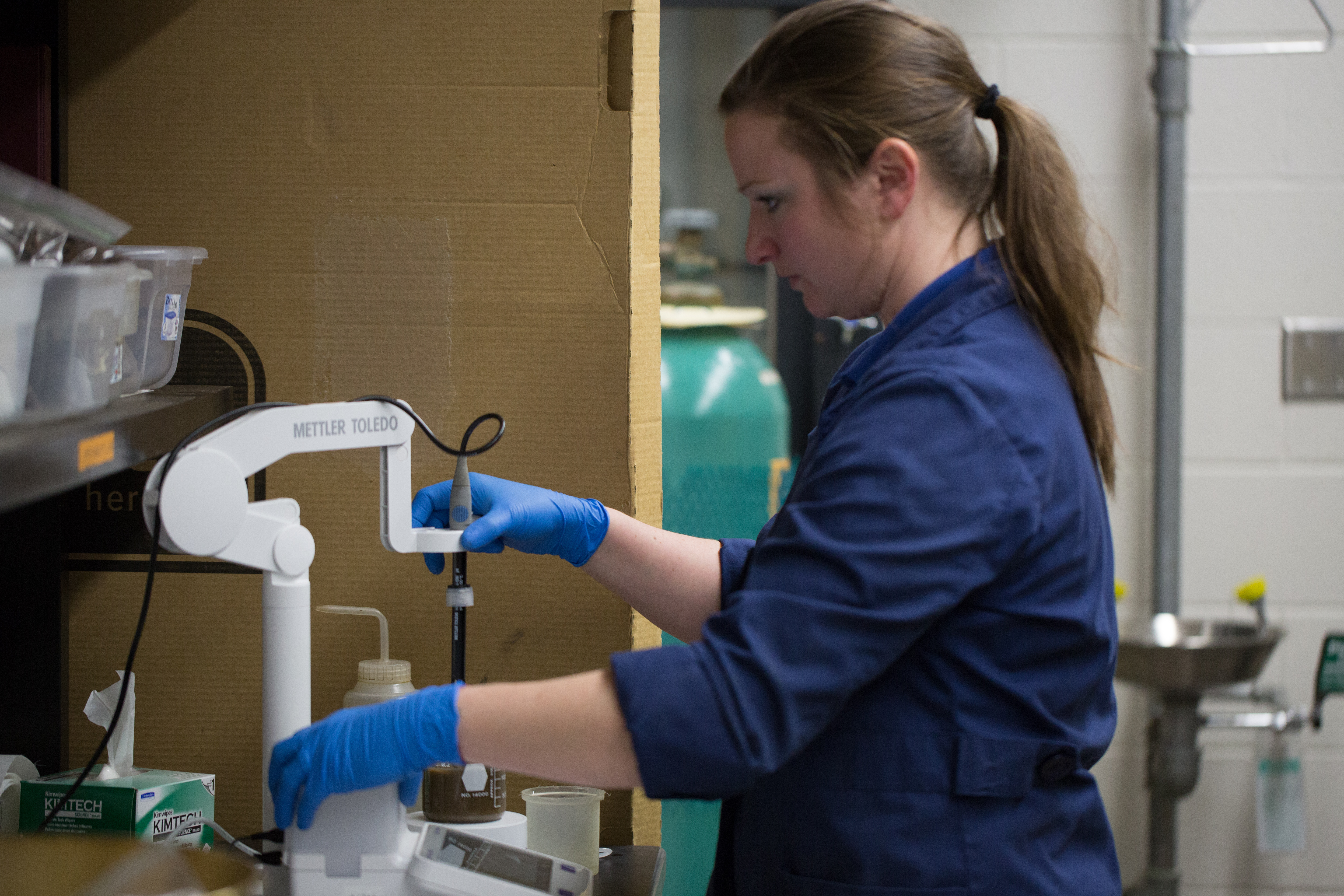 Amber Davidson, WIST Compostability Testing Laboratory Manager, prepares a sample for evaluation.